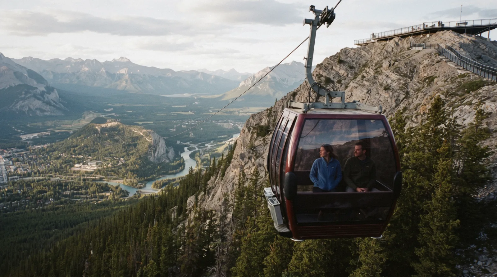 A Banff Gondola car climbing above the Bow Valley on its way up Sulphur Mountain